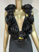 Black floral scarf with gold accents on a mannequin against a white background