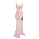 Pink floral dress with a sheer overlay on a white background