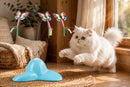 Automatic Spinning Butterfly Cat Teaser - Persian cat pouncing in sunny nook