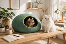 Handcrafted Wool Felt Cat Cave Bed in Scandinavian home with white Persian cat