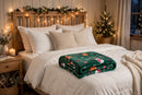 Cozy Gingerbread Fleece Throw Blanket - folded at foot of bed with Christmas lights