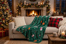 Cozy Gingerbread Fleece Throw Blanket - draped over couch by fireplace