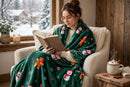 Cozy Gingerbread Fleece Throw Blanket - wrapped around reader in armchair