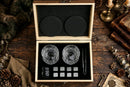 Whiskey Stones Glasses Gift Set - empty glasses in box, top-down antique table